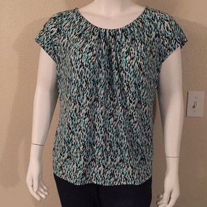 Splashed black, teal, and yellow on white blouse